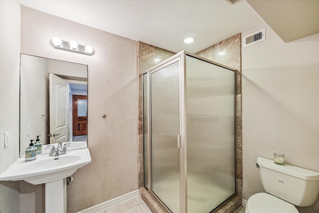 3227 Audley St, Houston, TX 77098 - full bath featuring a stall shower, tile patterned floors, and a textured ceiling