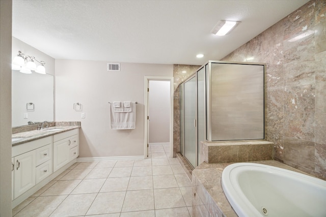 bathroom with separate shower and tub, tile patterned flooring, and vanity