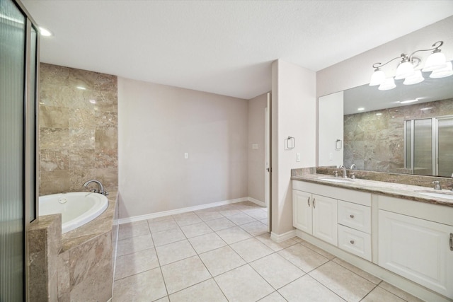3227 Audley St, Houston, TX 77098 - bathroom with double vanity, a garden tub, tile patterned floors, and an enclosed shower