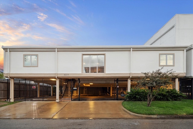 3227 Audley St, Houston, TX 77098 - view of front of home with stairs, a carport, and driveway