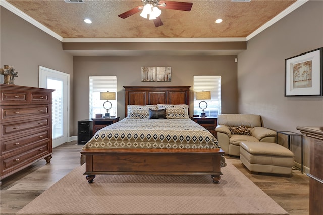 bedroom with ceiling fan, access to outside, a textured ceiling, wood-type flooring, and crown molding