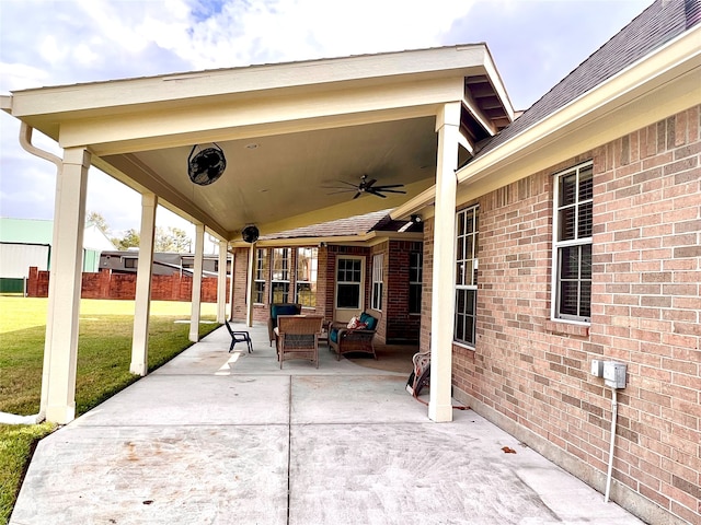 view of patio / terrace featuring ceiling fan