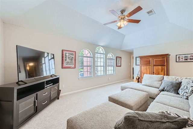 carpeted living room featuring lofted ceiling and ceiling fan