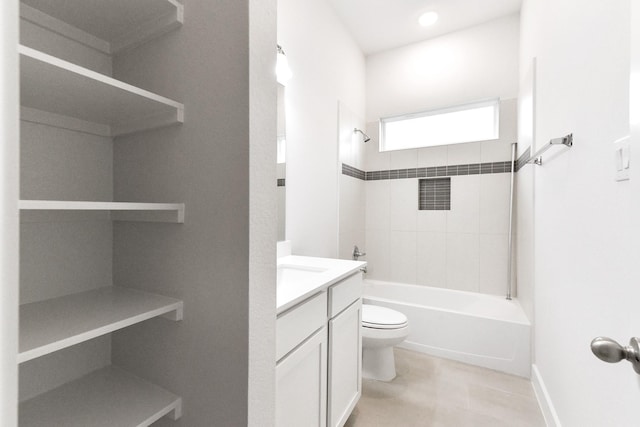 bathroom featuring toilet, tile patterned floors,  shower combination, and vanity