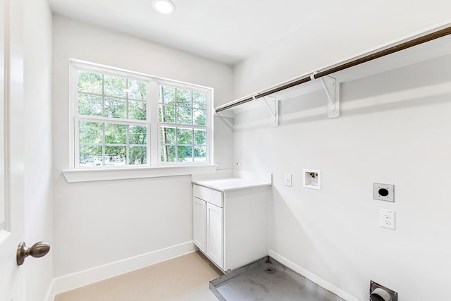 clothes washing area with washer hookup and electric dryer hookup