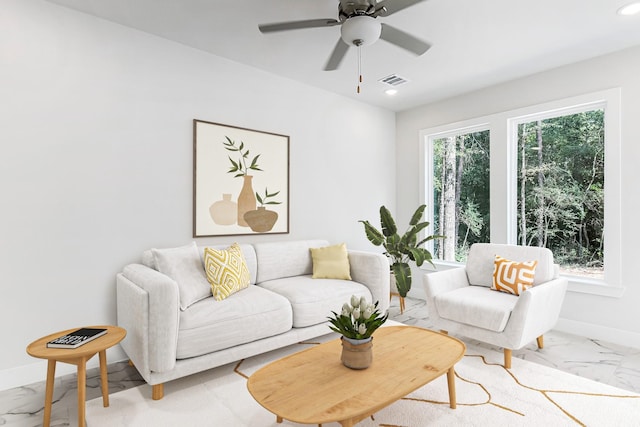 living room featuring ceiling fan