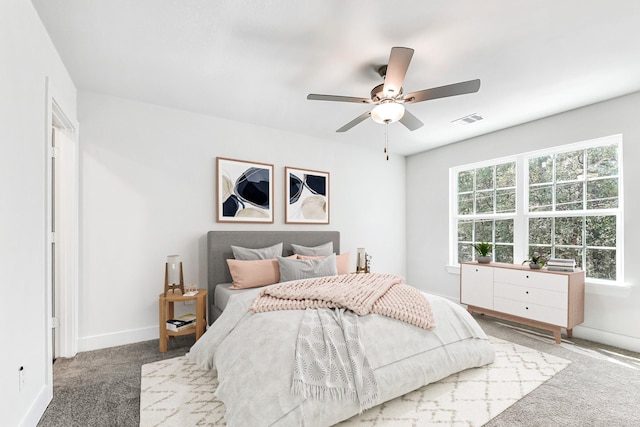 carpeted bedroom featuring ceiling fan