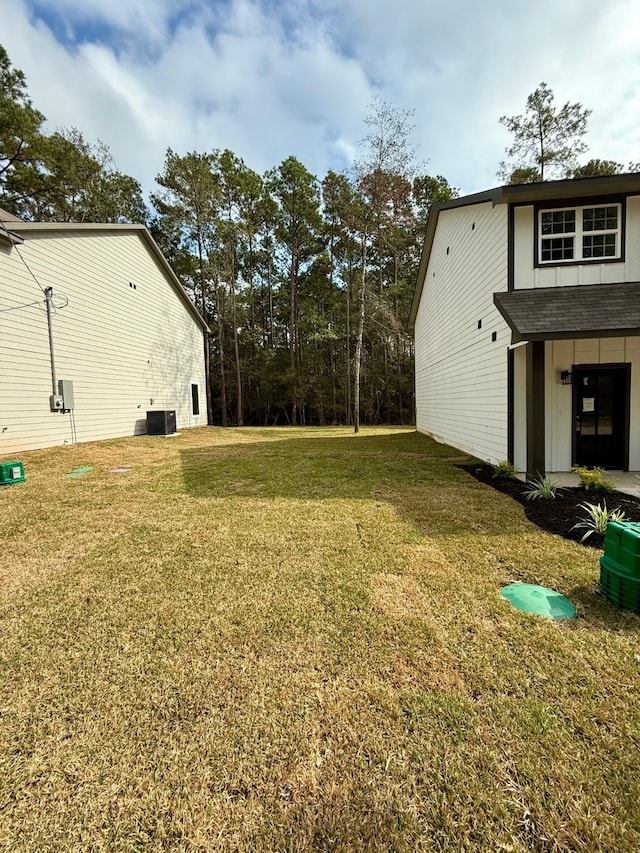 view of yard with cooling unit