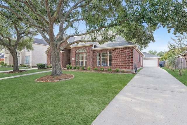 single story home featuring a front yard and a garage