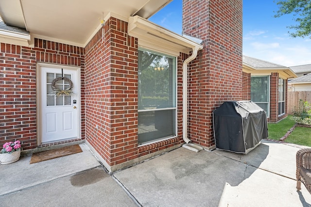 doorway to property featuring a patio