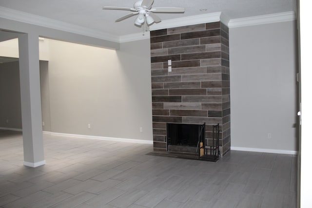 unfurnished living room with ornamental molding, a fireplace, and ceiling fan