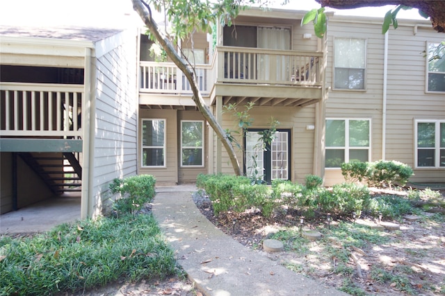 property entrance with a balcony