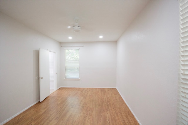 spare room featuring light wood-type flooring