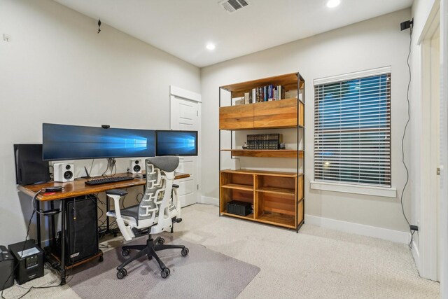 home office with light colored carpet