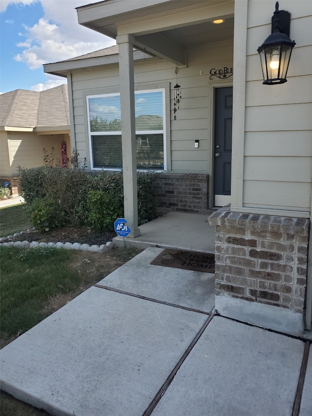 entrance to property with a porch