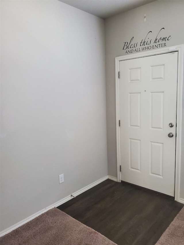 interior space with dark hardwood / wood-style floors