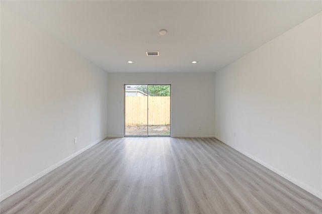 unfurnished room featuring light wood-type flooring