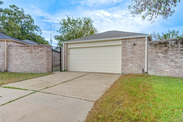 garage with a yard