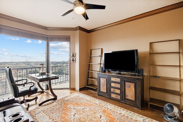 office featuring a wealth of natural light, crown molding, wood-type flooring, and ceiling fan