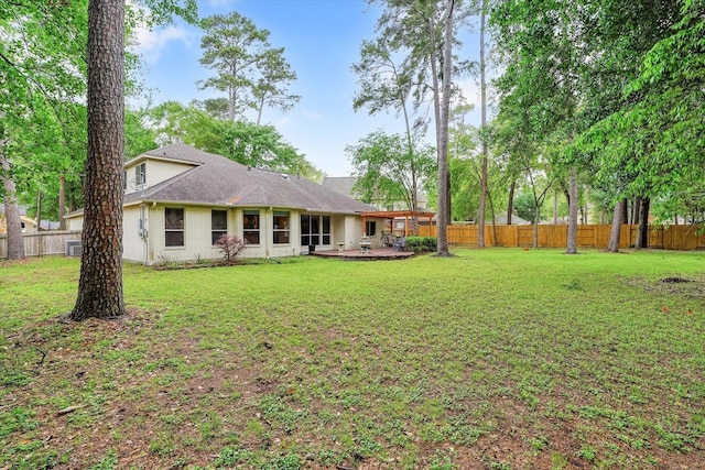 15420 Winterhaven Dr, Tomball, TX 77377 - back of house with a patio area