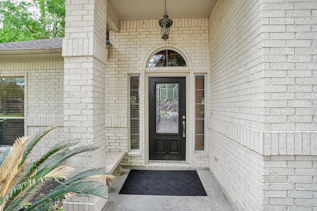 15420 Winterhaven Dr, Tomball, TX 77377 - property entrance with brick siding and roof with shingles