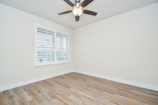 unfurnished room with light wood-type flooring and ceiling fan