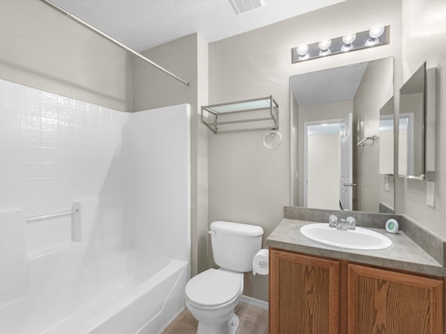 full bathroom featuring vanity, shower / bathing tub combination, and toilet