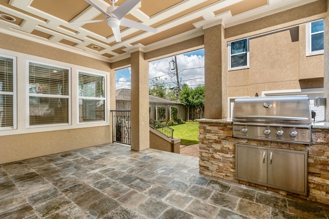 view of patio / terrace with area for grilling, ceiling fan, and grilling area