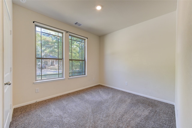 spare room with carpet flooring