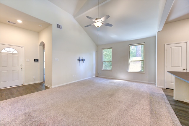 unfurnished living room featuring ceiling fan, high vaulted ceiling, and dark hardwood / wood-style floors