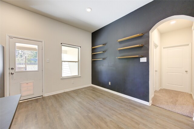 entrance foyer featuring hardwood / wood-style floors