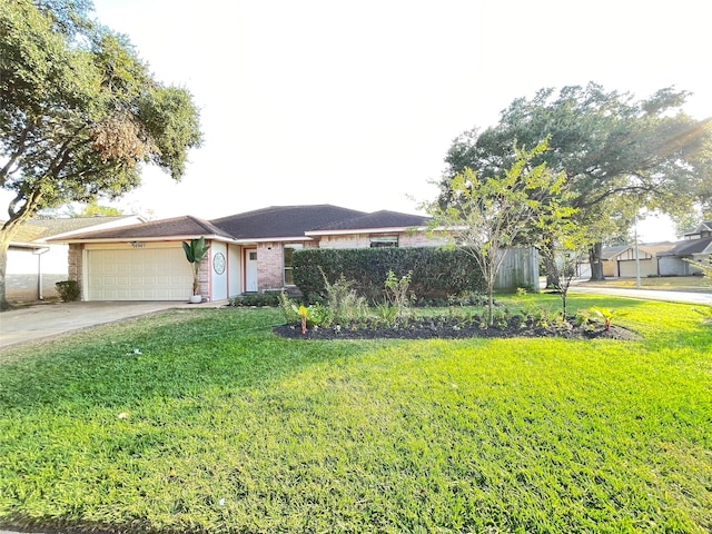 view of front facade featuring a front lawn and a garage