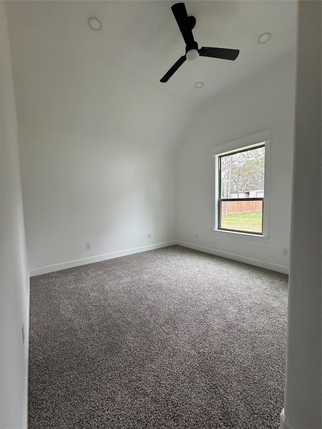 interior space featuring recessed lighting, carpet floors, a ceiling fan, baseboards, and vaulted ceiling