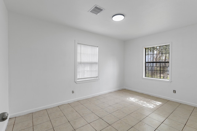 view of tiled spare room