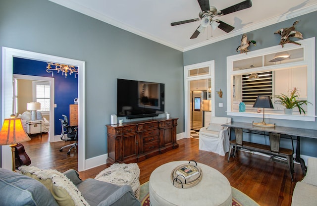 living room featuring crown molding, hardwood / wood-style flooring, and ceiling fan