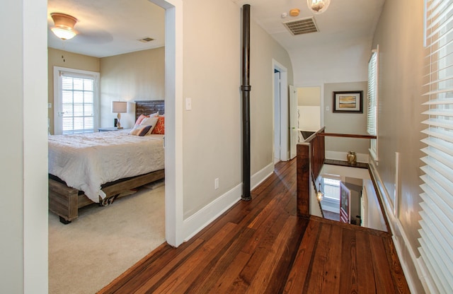 hall featuring dark wood-type flooring