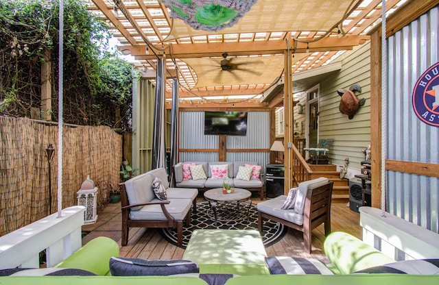 exterior space with a wooden deck, an outdoor hangout area, and a pergola