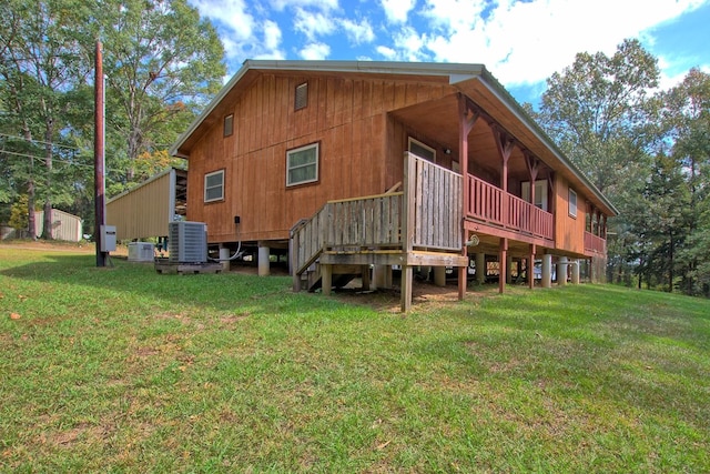 360 Oakhill Rd, Hemphill, TX 75948 - rear view of property with a lawn, central air condition unit, and a wooden deck