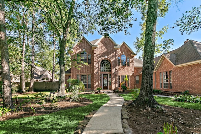 front of property with french doors and a balcony