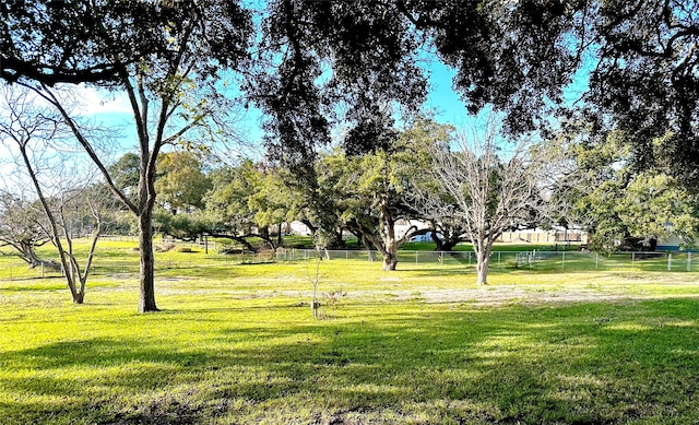 view of home's community featuring a yard