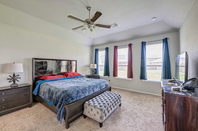 carpeted bedroom with ceiling fan, a textured ceiling, and lofted ceiling