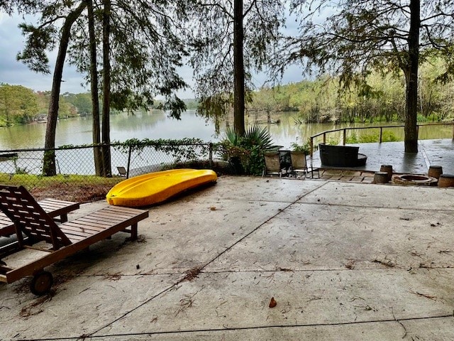 view of patio / terrace featuring a water view