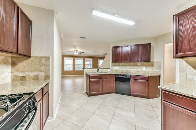 kitchen featuring kitchen peninsula, backsplash, light tile patterned flooring, black appliances, and sink