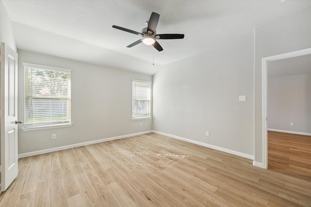 empty room featuring light hardwood / wood-style floors and ceiling fan