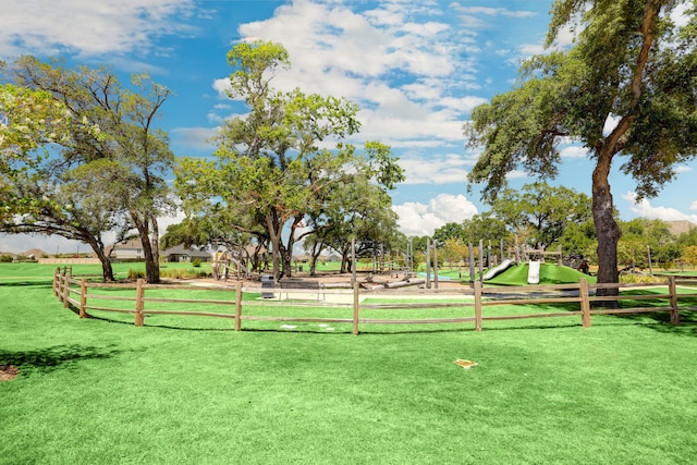 surrounding community with a lawn