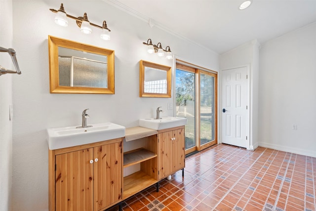 bathroom with vanity and crown molding