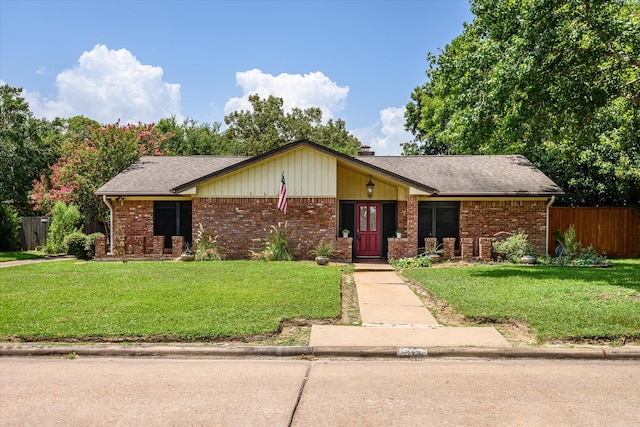 ranch-style home with a front yard