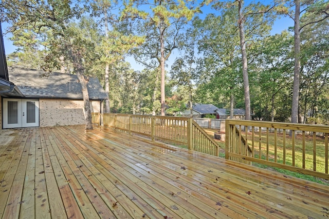 wooden deck with a yard