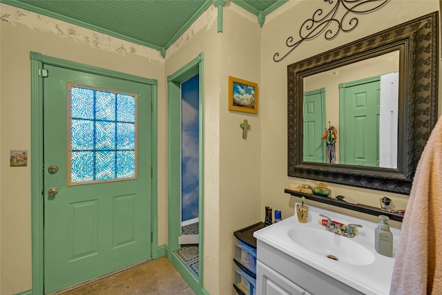 bathroom featuring vanity and crown molding