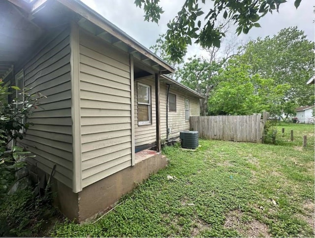 view of property exterior featuring a yard